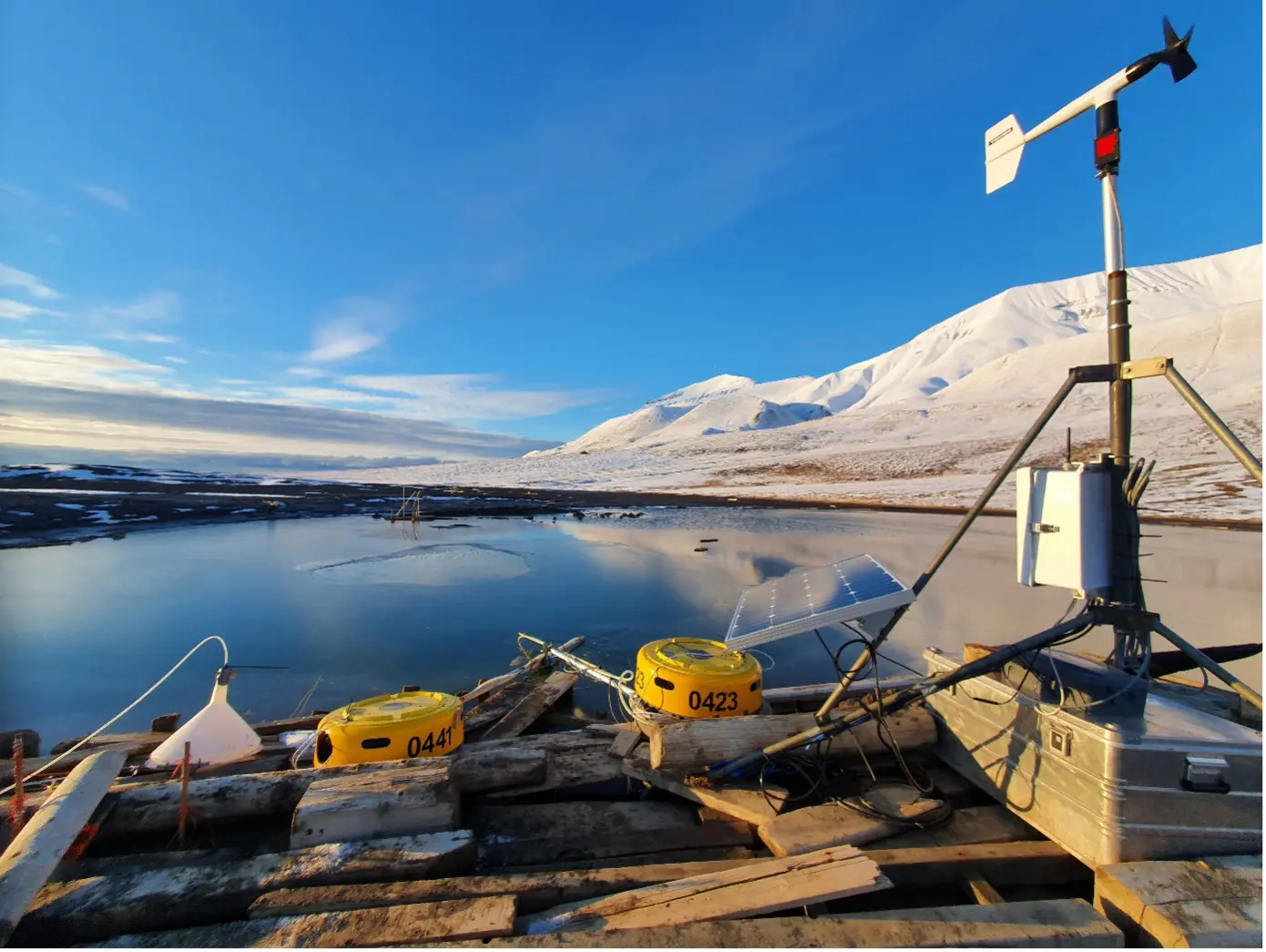 Lagoon Pingo Seep starts to freeze at the end of summer, but you can see how the constant gas emissions retard the rate of ice formation. Also shown is a system of hydrophones and dissolved methane detectors developed for flux monitoring as part of TerraSeep. The centre of the pool releases about 1 ton of methane each year.Lagoon Pingo Seep starts to freeze at the end of summer, but you can see how the constant gas emissions retard the rate of ice formation. Also shown is a system of hydrophones and dissolved methane detectors developed for flux monitoring as part of TerraSeep. The centre of the pool releases about 1 ton of methane each year.