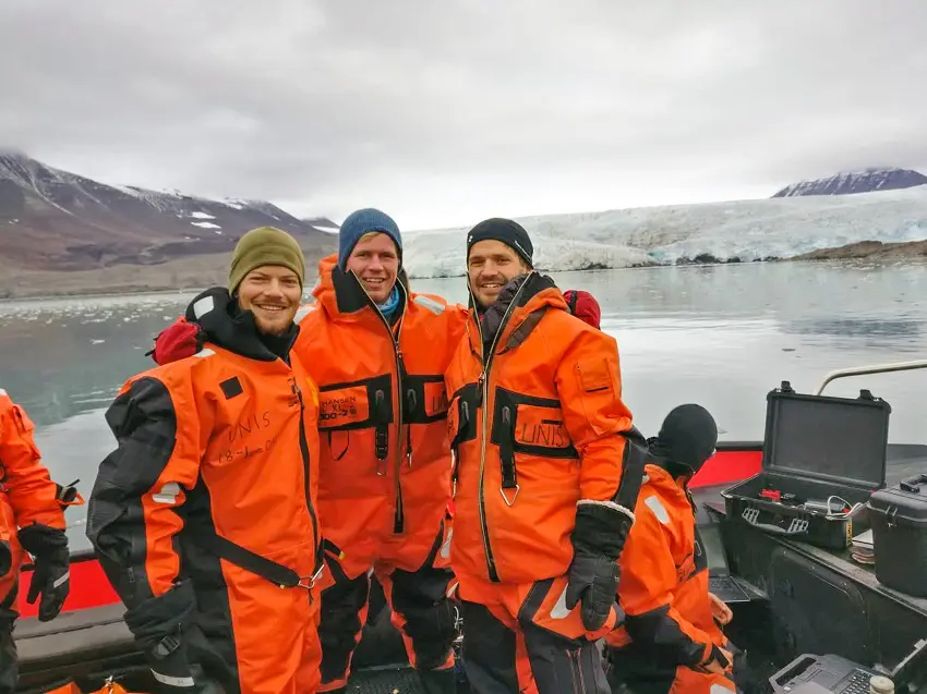 ThomasLone1 Three students in front of the Nordenskiöld glacier.