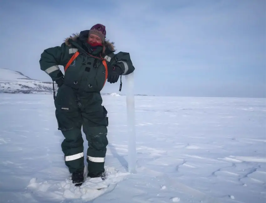 Vanessa Pitusi with ice core Research assistant Vanessa Pitusi with a 130 cm long sea ice core in Mohnbukta, east coast of Spitsbergen, 11 May 2020. (Photo: Janne Søreide/UNIS).