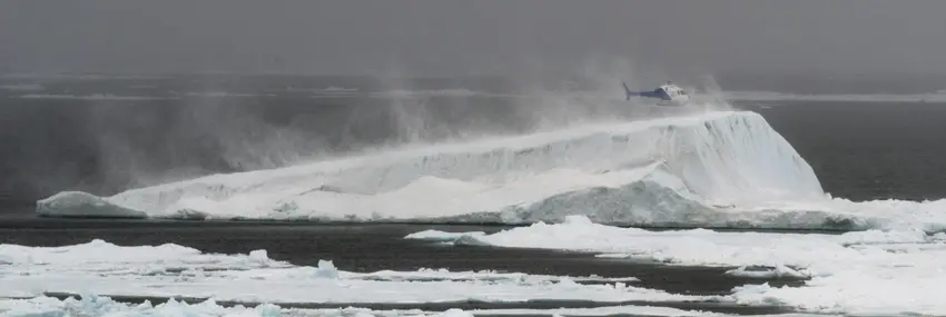 Helicopter landing on an iceberg